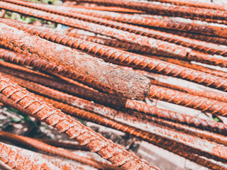 Scrapheap of left rusty metal in garbage dump