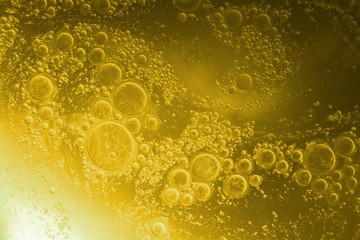 Yellow coocing Oil bubble on water. 