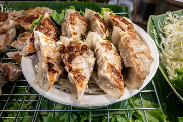 Fried Dumplings in white plate 