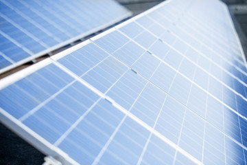 Obraz premium Close-up of solar panels on photovoltaic power plant