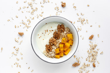 Bowl of homemade granola with yogurt and cereals