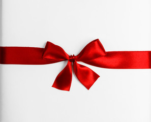Red ribbon bow isolated on white