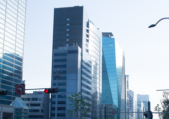 Contemporary architecture office building cityscape. Personal perspective concept. High-rise buildings against sky in city. Architecturally beautiful buildings. View of the city and skyscrapers.