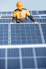 Workman on the solar station