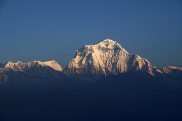 Landscape Nature himalaya rang mountain view of closeup Mt. Dhaulagiri massif.Dhaulagiri I is the seventh highest mountain in the world at 8,167 metresas seen from Poon Hill, Nepal - trekking route