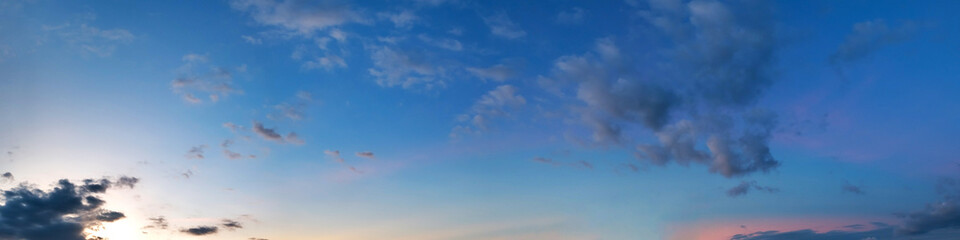 Panorama of Dramatic vibrant color with beautiful cloud of sunrise and sunset. Panoramic image.