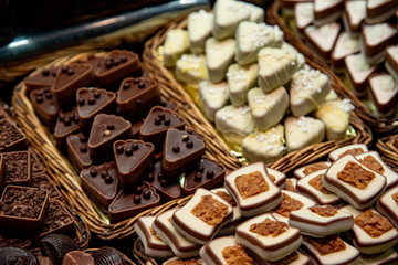 Variation of delicious and tasty sweet bar of chocolates at a chocolate market.