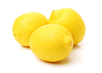 Ripe lemons on white background