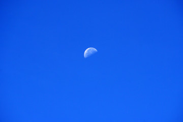 Nature scene of the moon in day time isolated with blue sky background - minimal abstract patterns ...