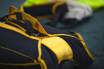 Details of the parachute for base jumping packed before jumping close-up.  Base jumping. Parachute equipment.