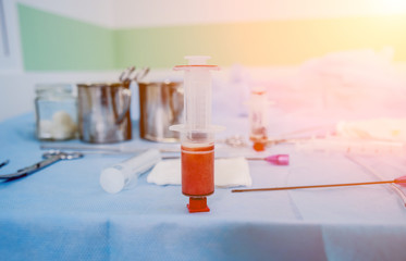 Platelet-Rich plasma preparation. Plasma in syringe. Centrifuge.