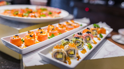 delicious sushi rolls set in a variety of japanese food