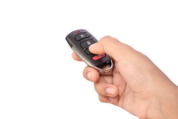 Mockup hand holding automatic door remote control isolated on white background with clipping path. Wireless technology concept.