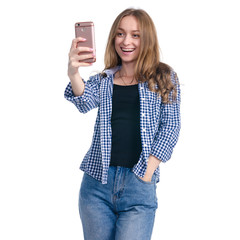 Portrait casual woman with mobile phone in hand standing smiling, making selfie, talking on skype...