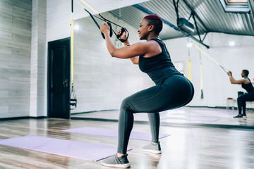 Black training muscular sportswoman