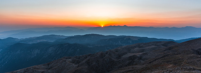 Beautiful sunset over Taurus Mountains from the top of Tahtali Mountain near Kemer, Antalya, Turkey