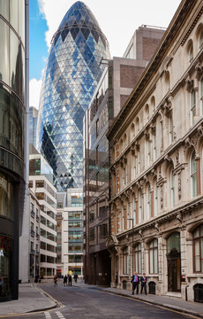 London city street scene with 30 St Mary Axe The Gherkin in background