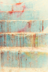 Vintage stone staircase with paint splashes. Texture background image.