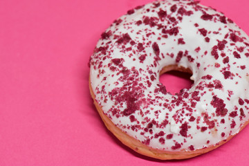Macro shoot of donut on pink