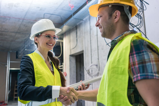 Handshake on the construction site