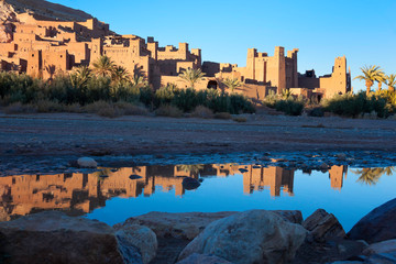 Fototapeta premium Kasbah Ait Ben Haddou with reflection in the river.