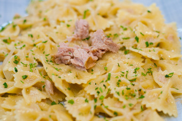 Delicious traditional Italian food. Pasta tuna, cheese and spices