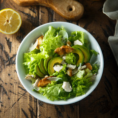 Homemade Caesar salad with chicken and avocado