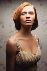 Belle Epoque, Beautiful Epoch concept. Young smiling lady with red hair in beige classic dress...