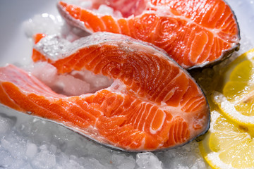 fresh raw salmon steak slices