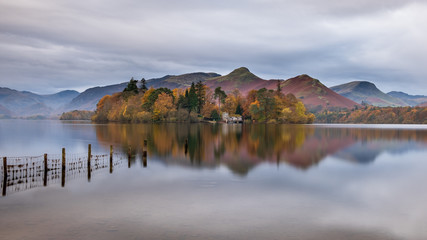 Autumn morning on the shores of Derwent Water, with Derwent Isle and boathouse in the distance
