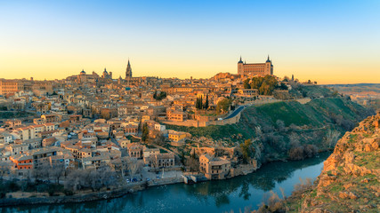 Breathtaking panoramic view of beautiful sunset over the old town of Toledo. Travel destination Spain - obrazy, fototapety, plakaty