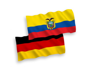 National vector fabric wave flags of Germany and Ecuador isolated on white background. 1 to 2 proportion.