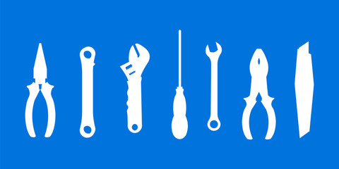 Vector white tools collection for repair isolated on blue background.