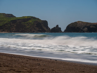 California Beach with long exposure to enjoy huge dangerous waves