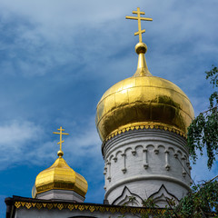 Fototapeta na wymiar Two domes of russian orthodox cathedral - Religion - Russia