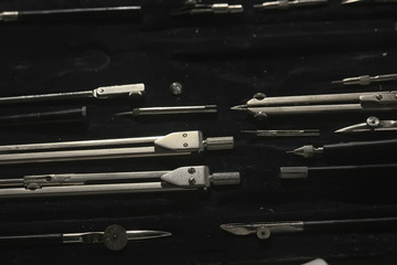 drawing tools, concept engineering project vintage / compass pencil paper education drafting