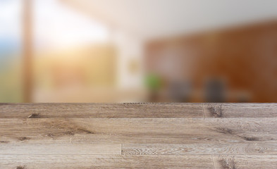 Empty interior with large window. Retro light bulb. The floor is of brown parquet.  3D rendering. wooden table. blurred background