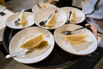 Dish with stuffed lemon on the plate