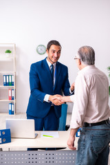 Financial advisor giving retirement advice to old man