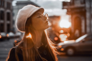 portrait of a beautiful girl on a city street