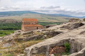 Fototapeta na wymiar Ancient cave city of Uplistsikhe and the Church of Uplistsuli