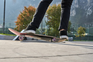 Fototapeta na wymiar Skateboarder is making extreme stunts
