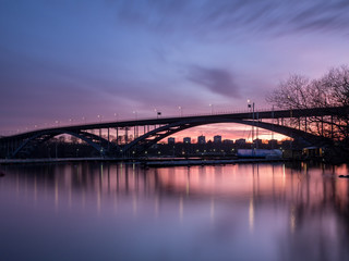 A colourful sunset behind Västerbron in Stockholm, Sweden