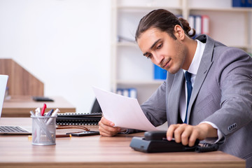 Fototapeta premium Unhappy male businessman in the office