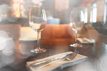 fork and knife serving in the interior of the restaurant / table in a cafe, food industry catering, menu