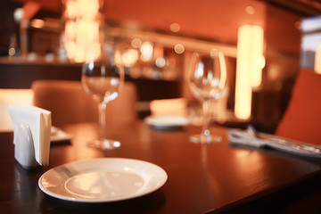 interior restaurant tableware / cutlery and tableware on a table in a cafe, beautiful catering industry
