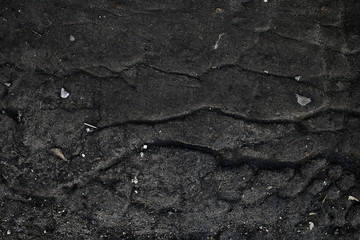 asphalt in cracks texture / abstract background cracks on asphalt road