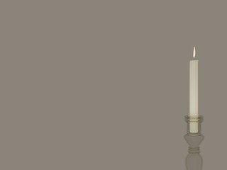 The candle burns on the stand.