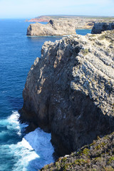 Dramatic and colorful cliffs at Cape St. Vincent (Cabo de Sao Vicente), Alentejo, Algarve, Portugal