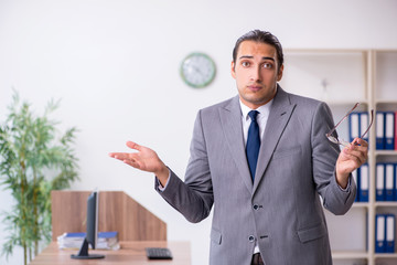 Unhappy male businessman in the office
